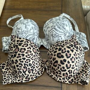 Two bras one leopard one black and white print Soma 34 DD